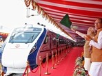 Prime Minister Narendra Modi flags off Vande Bharat Express, at Rani Kamlapati Station, in Bhopal on Saturday. Madhya Pradesh Chief Minister Shivraj Singh Chouhan also present. (ANI Photo)
