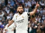 Real Madrid's Karim Benzema celebrates after scoring his side's third goal Real Madrid's Karim Benzema celebrates after scoring his side's third goal