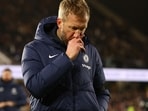Chelsea manager Graham Potter looks dejected after a match