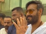 Ajay Devgn stepped out of his house for a while to meet the paparazzi and fans. Ajay Devgn stepped out of his house for a while to meet the paparazzi and fans.