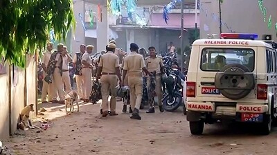 Security personnel deployed in wake of a clash that broke out between two groups following a Ram Navami procession on March 31 in Nalanda on Saturday. (ANI) Security personnel deployed in wake of a clash that broke out between two groups following a Ram Navami procession on March 31 in Nalanda on Saturday. (ANI)