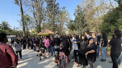 Around 70 citizens, including children, gathered at Sankey Tank park clad in black and sat silently briefly. During the protest, children and women were seen hugging the trees. (HT Photo) Around 70 citizens, including children, gathered at Sankey Tank park clad in black and sat silently briefly. During the protest, children and women were seen hugging the trees. (HT Photo)