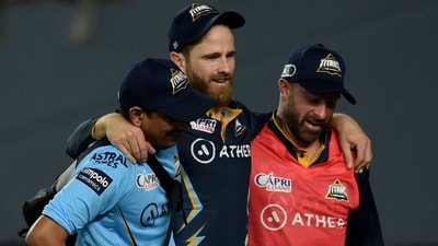 Gujarat Titans' Kane Williamson is helped by teammates back to the pavilion. (AFP) Gujarat Titans' Kane Williamson is helped by teammates back to the pavilion. (AFP)