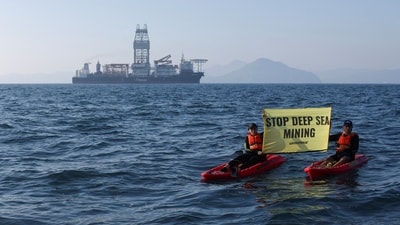 Greenpeace activists from New Zealand and Mexico confront the deep sea mining vessel Hidden Gem, commissioned by Canadian miner The Metals Company, as it returned to port from eight weeks of test mining in the Clarion-Clipperton Zone between Mexico and Hawaii, off the coast of Manzanillo, Mexico November 16, 2022. (REUTERS)