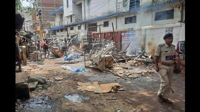 Police keep vigil after a clash erupted in Sasaram, on Saturday. (AFP) Police keep vigil after a clash erupted in Sasaram, on Saturday. (AFP)