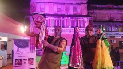 Pradeep Nath Tripathi (left) and KK Rai with rod puppets after a performance. (HT Photo) Pradeep Nath Tripathi (left) and KK Rai with rod puppets after a performance. (HT Photo)