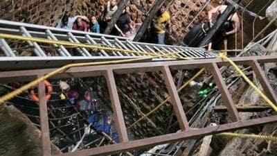 Rescuers pull out bodies from a stepwell that collapsed at Beleshwar Mahadev Jhulelal temple in Madhya Pradesh’s Indore (Twitter Photo) Rescuers pull out bodies from a stepwell that collapsed at Beleshwar Mahadev Jhulelal temple in Madhya Pradesh’s Indore (Twitter Photo)