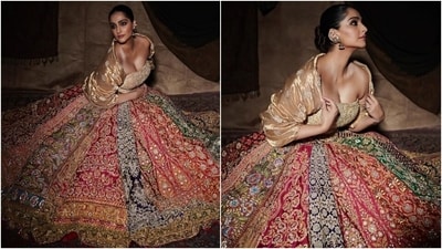 The Abu Jani Sandeep Khosla ensemble features a multi-coloured lehenga skirt decked in embroidered panels, a layered ghera, and an A-line silhouette. (Instagram) The Abu Jani Sandeep Khosla ensemble features a multi-coloured lehenga skirt decked in embroidered panels, a layered ghera, and an A-line silhouette. (Instagram)