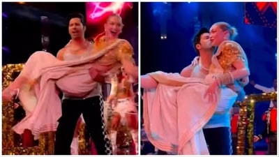 Varun Dhawan picked Gigi Hadid in his arms and spun her around on stage. Varun Dhawan picked Gigi Hadid in his arms and spun her around on stage.