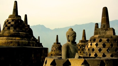 Borobudur Temple, Indonesia: This 9th-century Mahayana Buddhist temple is the world's largest Buddhist temple and is a UNESCO World Heritage site. It features over 500 Buddha statues and 2,600 relief panels depicting Buddhist teachings. (Unsplash)
