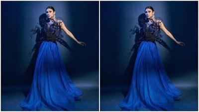 Mouni posed in the backless gown with knot details as she gave us fresh fashion inspo. The actor further accessorised her look in statement earrings. (Instagram/@imouniroy) Mouni posed in the backless gown with knot details as she gave us fresh fashion inspo. The actor further accessorised her look in statement earrings. (Instagram/@imouniroy)