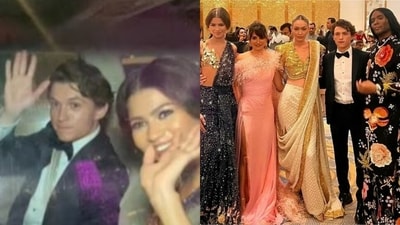 Zendaya and Tom Holland waved and smiled at the paparazzi. Zendaya and Tom Holland waved and smiled at the paparazzi.