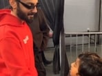 Anirudh with a young fan in the US.