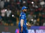 Mumbai Indians' captain Rohit Sharma reacts as he leaves the field after their loss in the Indian Premier League cricket match against Royal Challengers Bangalore in Bengaluru.