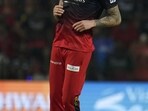 Royal Challengers Bangalore's Reece Topley reacts after bowling a delivery Royal Challengers Bangalore's Reece Topley reacts after bowling a delivery