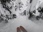 Snowboarder saves life of a man stuck in a tree well. Snowboarder saves life of a man stuck in a tree well.