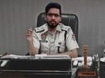 In picture, a photoshopped image of the accused seen in IPS uniform.