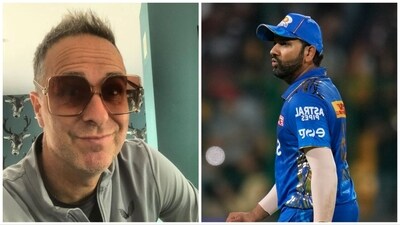 Michael Vaughan has questioned Rohit Sharma's captaincy credentials after Mumbai Indians (MI) suffered a humiliating defeat (AP-Michael Vaughan Instagram) Michael Vaughan has questioned Rohit Sharma's captaincy credentials after Mumbai Indians (MI) suffered a humiliating defeat (AP-Michael Vaughan Instagram)