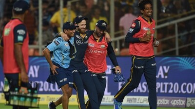 Gujarat Titans' Kane Williamson is helped by teammates after he was injured during IPL 2023 (AFP)