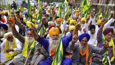 Farmers staging a protest in Amritsar on Monday against the imposition of National Security Act (NSA) on Sikh hardliners and also demanding compensation for their crops damaged by the rain. (Sameer Sehgal/HT) Farmers staging a protest in Amritsar on Monday against the imposition of National Security Act (NSA) on Sikh hardliners and also demanding compensation for their crops damaged by the rain. (Sameer Sehgal/HT)