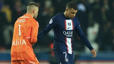 PSG's Kylian Mbappe, right, and Lyon's goalkeeper Anthony Lopes shake hands after the French League One soccer match between Paris Saint-Germain and Lyon (AP) PSG's Kylian Mbappe, right, and Lyon's goalkeeper Anthony Lopes shake hands after the French League One soccer match between Paris Saint-Germain and Lyon (AP)