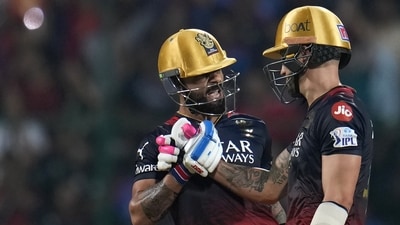 Royal Challengers Bangalore captain Faf du Plessis celebrates with Virat Kohli after scoring fifty against Mumbai Indians (AP) Royal Challengers Bangalore captain Faf du Plessis celebrates with Virat Kohli after scoring fifty against Mumbai Indians (AP)