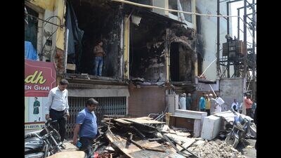 Nehru Complex after Saturday’s fire (HT) Nehru Complex after Saturday’s fire (HT)