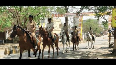 Police keep vigil in Bihar Sharif on Monday. (HT Photo)