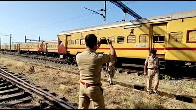 Police personnel investigate the train fire incident, in Kerala’s Kozhikode on Monday. (ANI) Police personnel investigate the train fire incident, in Kerala’s Kozhikode on Monday. (ANI)