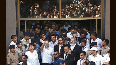 Rahul Gandhi outside the Surat court on Monday. (AP) Rahul Gandhi outside the Surat court on Monday. (AP)