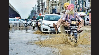 Water logging after rain near Aarti chowk on Ferozepur road in Ludhiana on Monday. (Gurpreet Singh/HT Photo)