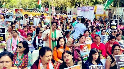 At Delhi's Jantar Mantar, Congress' women wing organises 'save democracy' rally on Monday in a bid to protest against Rahul Gandhi's conviction and attack the Narendra Modi government on a host of issues including the leading flashpoint between the two parties - the Adani crisis. At Delhi's Jantar Mantar, Congress' women wing organises 'save democracy' rally on Monday in a bid to protest against Rahul Gandhi's conviction and attack the Narendra Modi government on a host of issues including the leading flashpoint between the two parties - the Adani crisis.