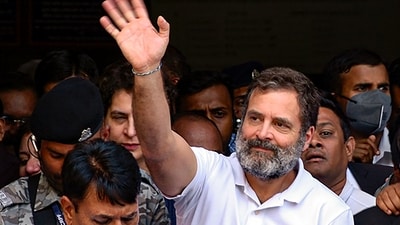 Rahul Gandhi waving at a crowd of supporters after stepping out of Surat court on Monday. Rahul Gandhi waving at a crowd of supporters after stepping out of Surat court on Monday.