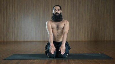 To aid in digestion, it is suggested to either take a short walk for about 100 steps or sit in Vajrasana. This can help improve blood circulation to the digestive system, reduce bloating, and improve digestion. (Grand Master Akshar)