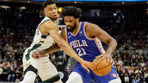 Philadelphia 76ers center Joel Embiid (21) drives against Milwaukee Bucks forward Giannis Antetokounmpo, left, during the first half of an NBA basketball game Sunday, April 2, 2023, in Milwaukee. (AP) Philadelphia 76ers center Joel Embiid (21) drives against Milwaukee Bucks forward Giannis Antetokounmpo, left, during the first half of an NBA basketball game Sunday, April 2, 2023, in Milwaukee. (AP)