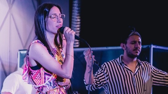 Karaoke Night - Find a local bar that offers karaoke and have some fun singing your favorite songs together. You don't need to be a great singer to have a good time!(Unsplash)