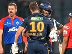 Gujarat Titans' David Miller, centre, hugs Sai Sudharsan as they celebrate after winning the Indian Premier League match