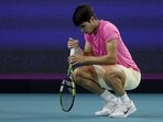 Carlos Alcaraz of Spain pauses on the court after losing a point against Jannik Sinner Carlos Alcaraz of Spain pauses on the court after losing a point against Jannik Sinner