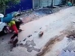 All three passengers were seen riding the scooter without wearing helmets. (Twitter) All three passengers were seen riding the scooter without wearing helmets. (Twitter)