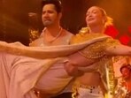 Varun Dhawan lifted Gigi Hadid and kissed her during the NMACC gala. Varun Dhawan lifted Gigi Hadid and kissed her during the NMACC gala.
