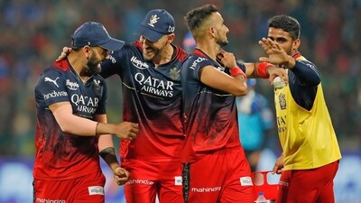 Bengaluru, Apr 02 (ANI): Royal Challengers Bangalore's skipper Faf du Plessis and teammates celebrate a wicket in a match against Mumbai Indians during the Indian Premier League (IPL) 2023, at M.Chinnaswamy Stadium, in Bengaluru on Sunday. (ANI Photo) (IndianPremierLeague twitter) Bengaluru, Apr 02 (ANI): Royal Challengers Bangalore's skipper Faf du Plessis and teammates celebrate a wicket in a match against Mumbai Indians during the Indian Premier League (IPL) 2023, at M.Chinnaswamy Stadium, in Bengaluru on Sunday. (ANI Photo) (IndianPremierLeague twitter)