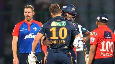 Gujarat Titans' David Miller, centre, hugs Sai Sudharsan as they celebrate after winning the Indian Premier League match (AP) Gujarat Titans' David Miller, centre, hugs Sai Sudharsan as they celebrate after winning the Indian Premier League match (AP)