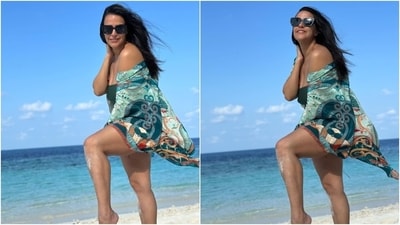 Neha Dhupia, her husband Angad Bedi, and their two kids travelled to the Maldives recently to enjoy a family holiday amid the sun, white sand beaches, palm trees, and clear blue waters. The couple has been sharing snippets from their dreamy vacation. Neha's posts gave her fans a glimpse of her breezy, chic and steal-worthy vacation wardrobe. It features maxi dresses, printed kaftans, swimsuits, floral printed mini dresses, slip-on beach outfits, and more. Keep scrolling to check out all the images. (Instagram) Neha Dhupia, her husband Angad Bedi, and their two kids travelled to the Maldives recently to enjoy a family holiday amid the sun, white sand beaches, palm trees, and clear blue waters. The couple has been sharing snippets from their dreamy vacation. Neha's posts gave her fans a glimpse of her breezy, chic and steal-worthy vacation wardrobe. It features maxi dresses, printed kaftans, swimsuits, floral printed mini dresses, slip-on beach outfits, and more. Keep scrolling to check out all the images. (Instagram)