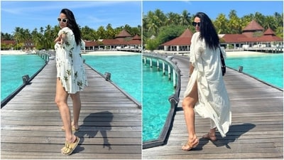 One of our favourite beach looks of Neha shows the actor in a white-coloured floral mini dress and a kaftan-style slip-on ensemble. While Neha styled the tiered mini dress with strappy sandals, no makeup, open locks and sunglasses, she wore the polka-dot embroidered midi outfit with tan sandals, a shoulder bag, a watch, open hair, and sunglasses. (Instagram) One of our favourite beach looks of Neha shows the actor in a white-coloured floral mini dress and a kaftan-style slip-on ensemble. While Neha styled the tiered mini dress with strappy sandals, no makeup, open locks and sunglasses, she wore the polka-dot embroidered midi outfit with tan sandals, a shoulder bag, a watch, open hair, and sunglasses. (Instagram)