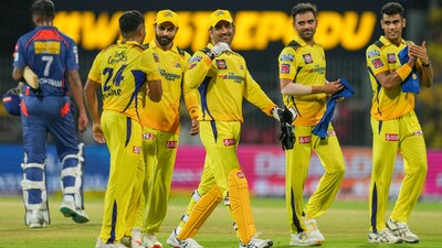 MS Dhoni and a victorious CSK team. (PTI) MS Dhoni and a victorious CSK team. (PTI)