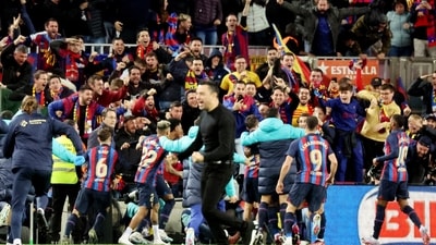 FC Barcelona fans celebrate with players after Franck Kessie scores their second goal (REUTERS)