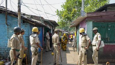 Security personnel in Hooghly on Tuesday. (PTI) Security personnel in Hooghly on Tuesday. (PTI)