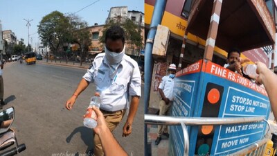 Man helps Hyderabad traffic police working in summer heat. (Instagram/@Nikhil Nayak) Man helps Hyderabad traffic police working in summer heat. (Instagram/@Nikhil Nayak)
