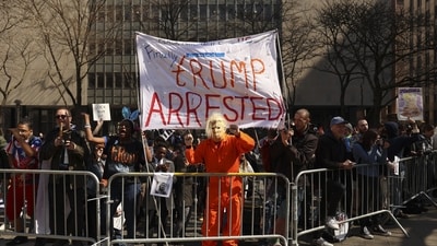 Demonstrators gather outside New York criminal court, Tuesday in New York. (AP) Demonstrators gather outside New York criminal court, Tuesday in New York. (AP)