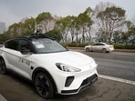 A car of Baidu's driverless robotaxi service Apollo Go is seen on a road in Wuhan, Hubei province. (Reuters)